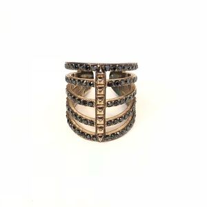 Henri Bendel gold ring with dark grey stones